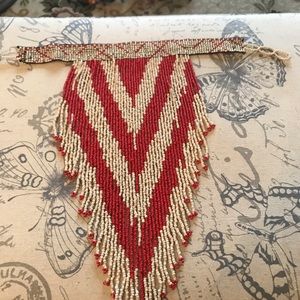 Beaded collar necklace.